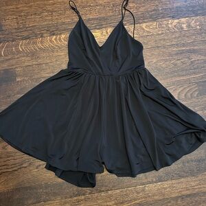 Cocktail dress that has shorts underneath- perfect condition and swingy fabric